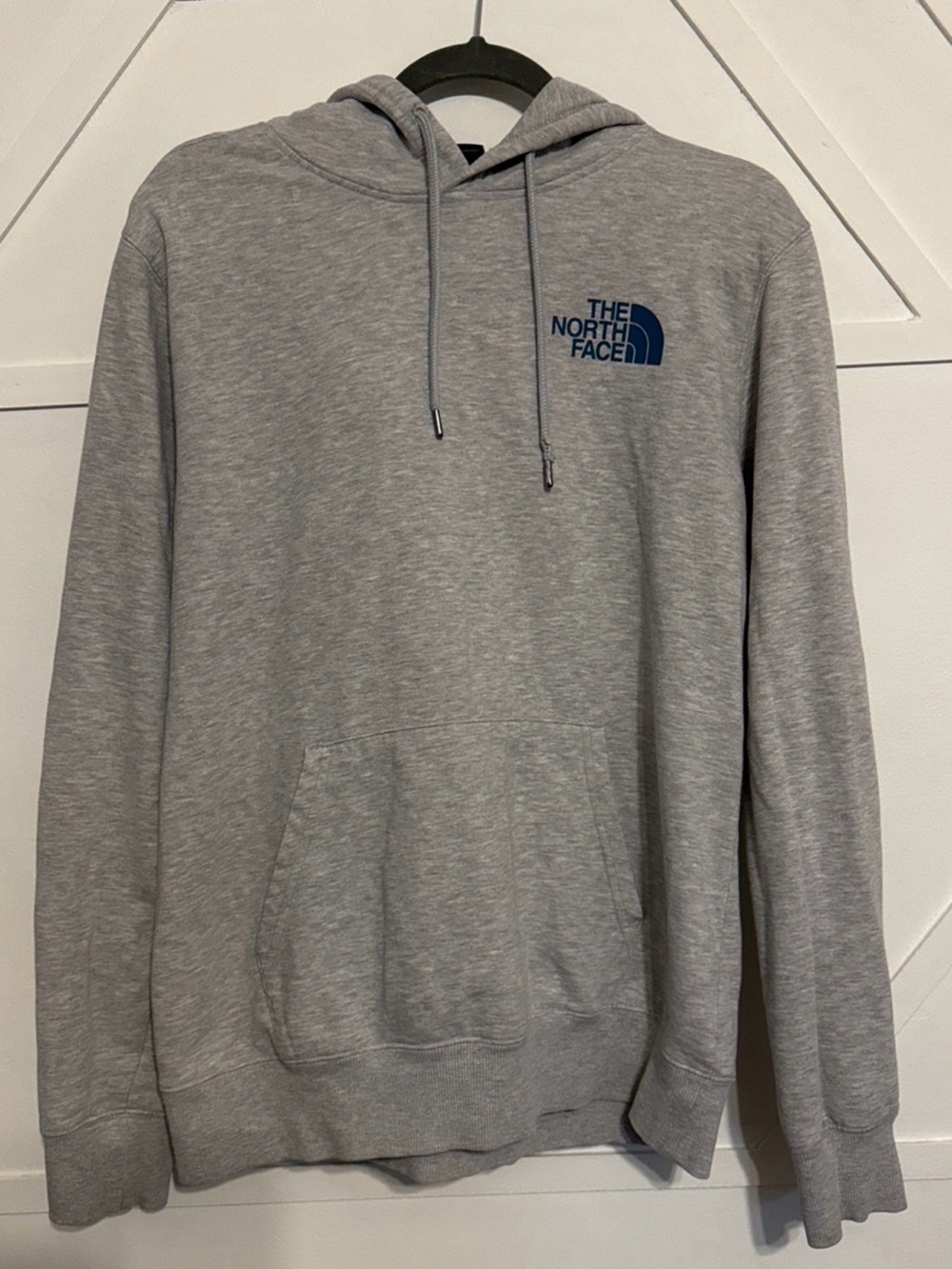 The North Face Men’s Heather Gray Pullover Hoodie with Navy Logo